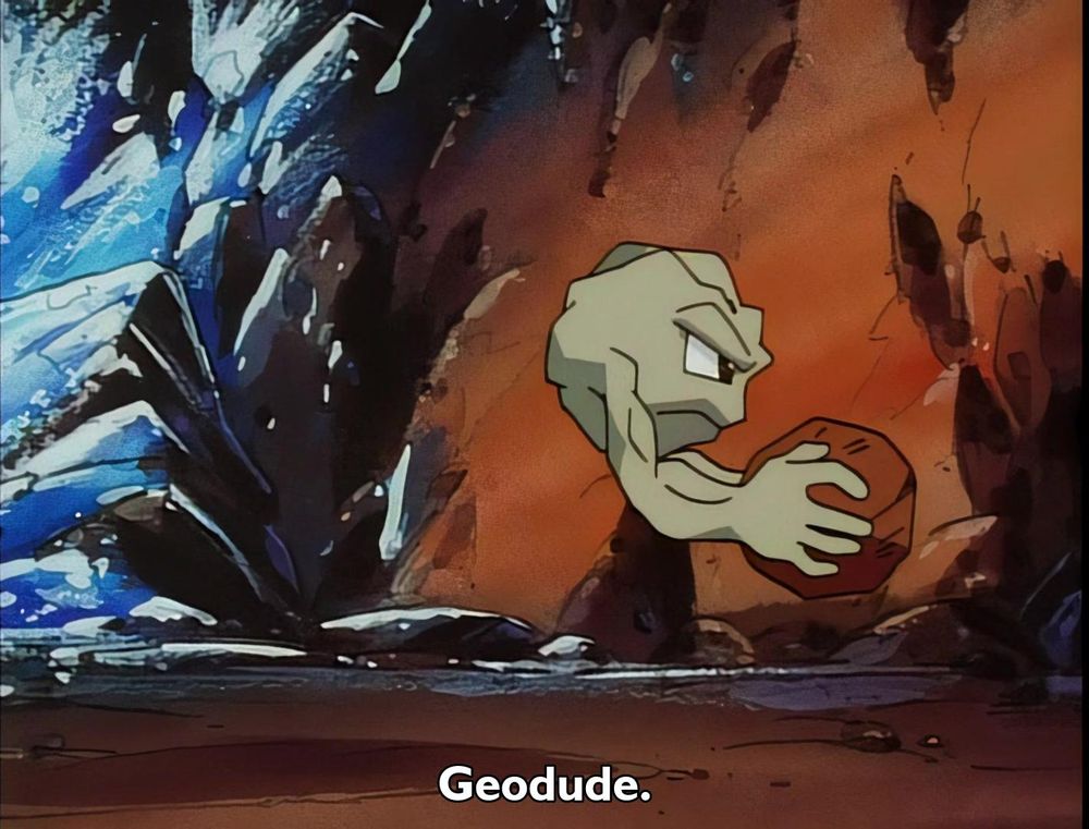 Pokemon - Season 1 Episode 59 - Volcanic Panic (2)
Frame 1451/2420
Caption: Geodude.

Timestamp: 00:13:53.158