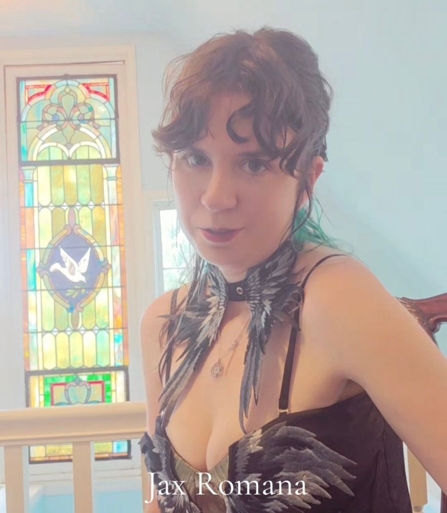 Jax and a stained glass window in her angel dress