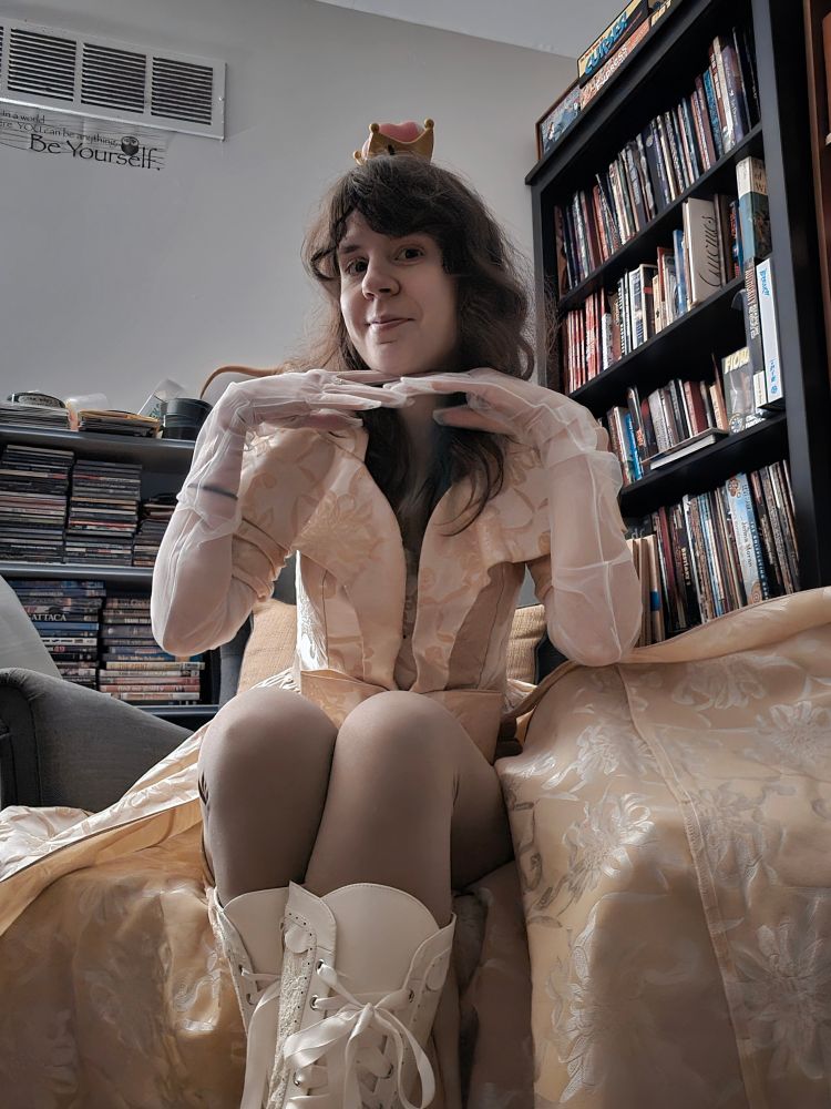 Jax in the Super Koopa Crown and a big vintage dress with white boots and white gloves