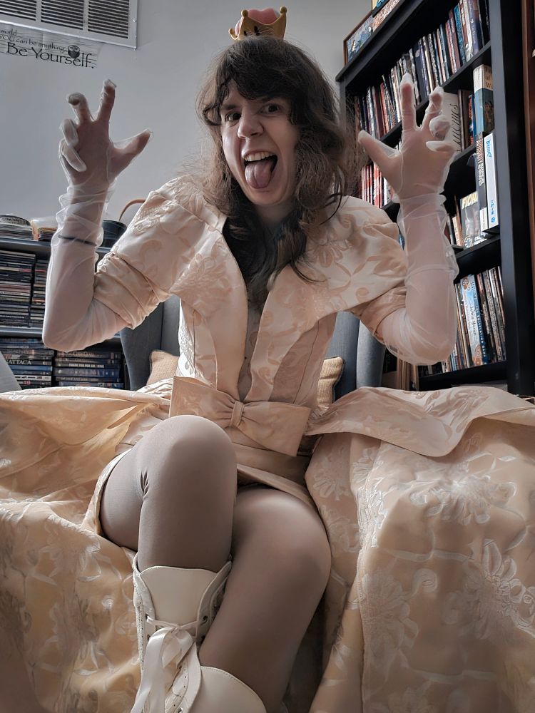 Jax in the Super Koopa Crown and a big vintage dress with white boots and white gloves