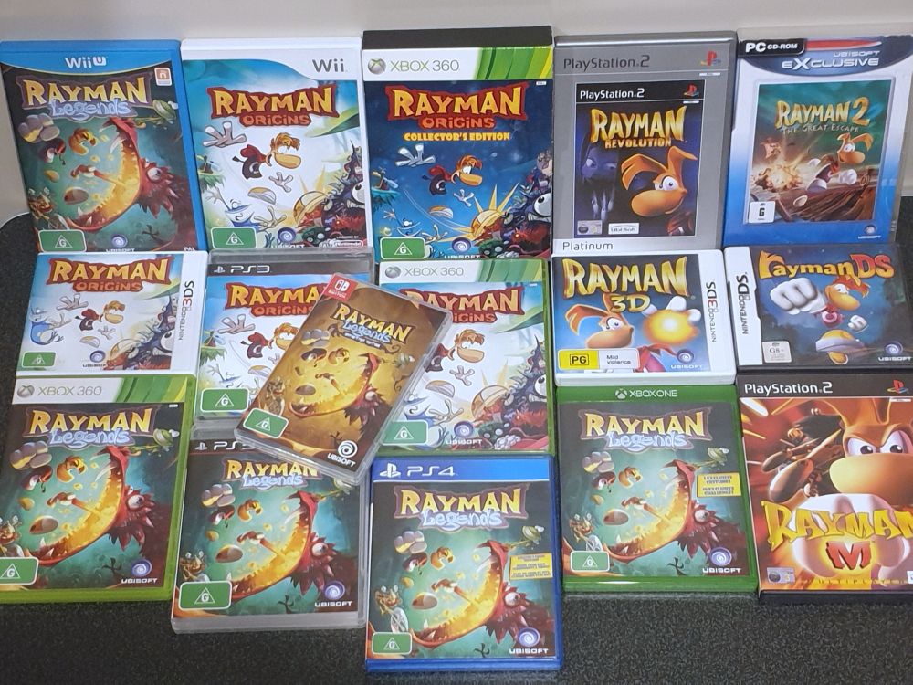 A collection of Rayman games and ports on several systems. From top-bottom, left-right: Legends (Wii U), Origins (Wii), Origins Collector's Edition (X360), Revolution (PS2), 2 (PC) Origins (3DS), Origins (PS3), Legends Definitive Edition (Switch), Origins (X360), 3D (3DS), DS (DS) Legends (X360), Legends (PS3), Legends (PS4), Legends (XONE), M (PS2)