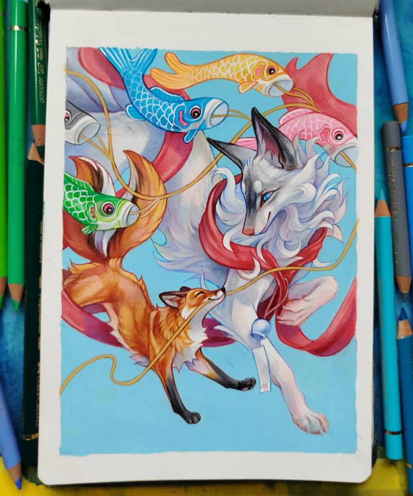 A sketchbook page drawing of two foxes. One is large, white and graceful with a red scarf, the other is small, orange and flying multicoloured fish koinobori flags.