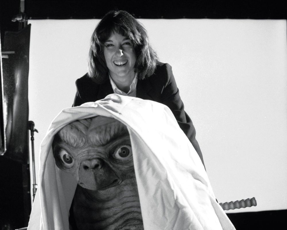 Kathleen Kennedy and E.T. on the set of "E.T. the Extra-Terrestrial" (1982).