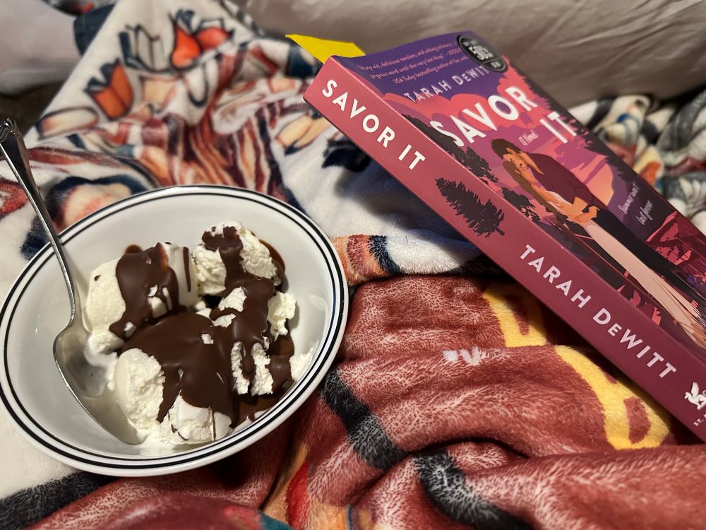 Bowl of vanilla ice cream with the book “Savor It” by Tarah DeWitt.