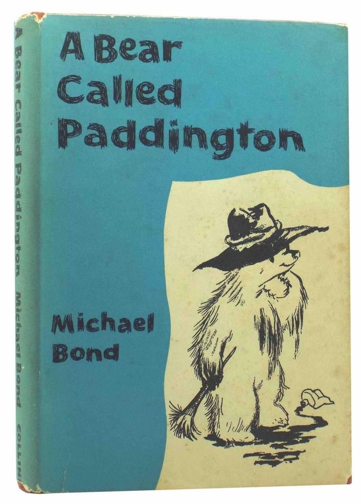 A Bear Called Paddington by Michael Bond, 1958 edition: a small bear, in a hat, with a brush and spilt paint