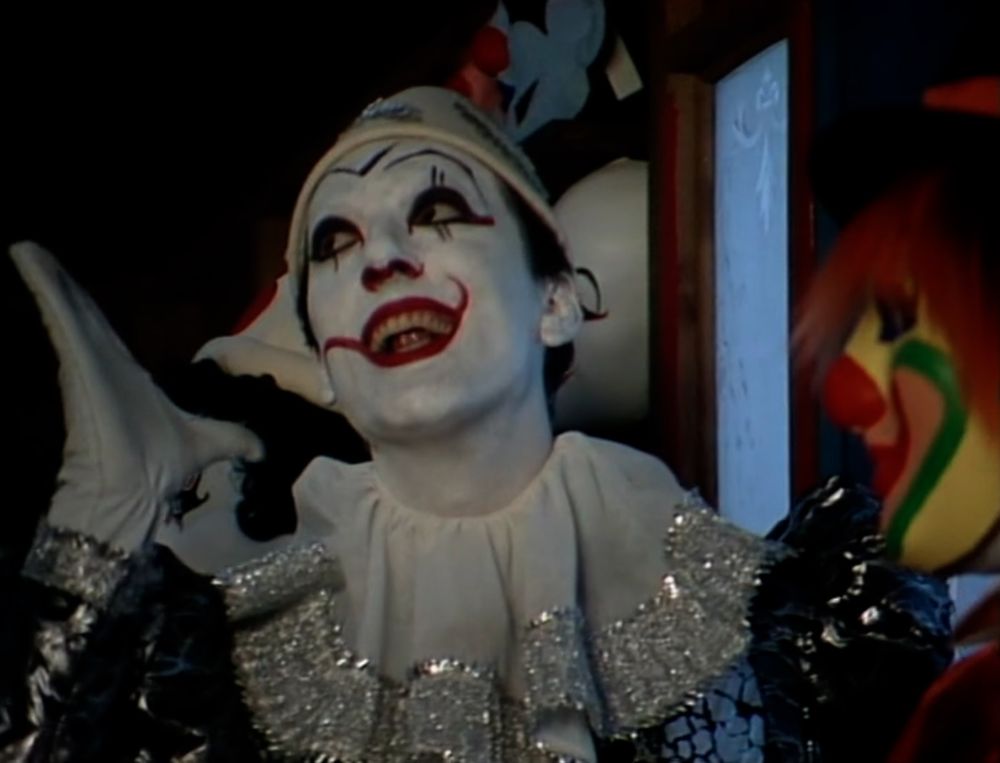 The Chief Clown smiles creepily. No, creepier than that!