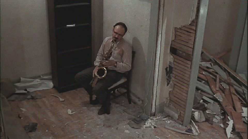 Gene Hackman playing the sax, after ripping apart his apartment, in The Conversation