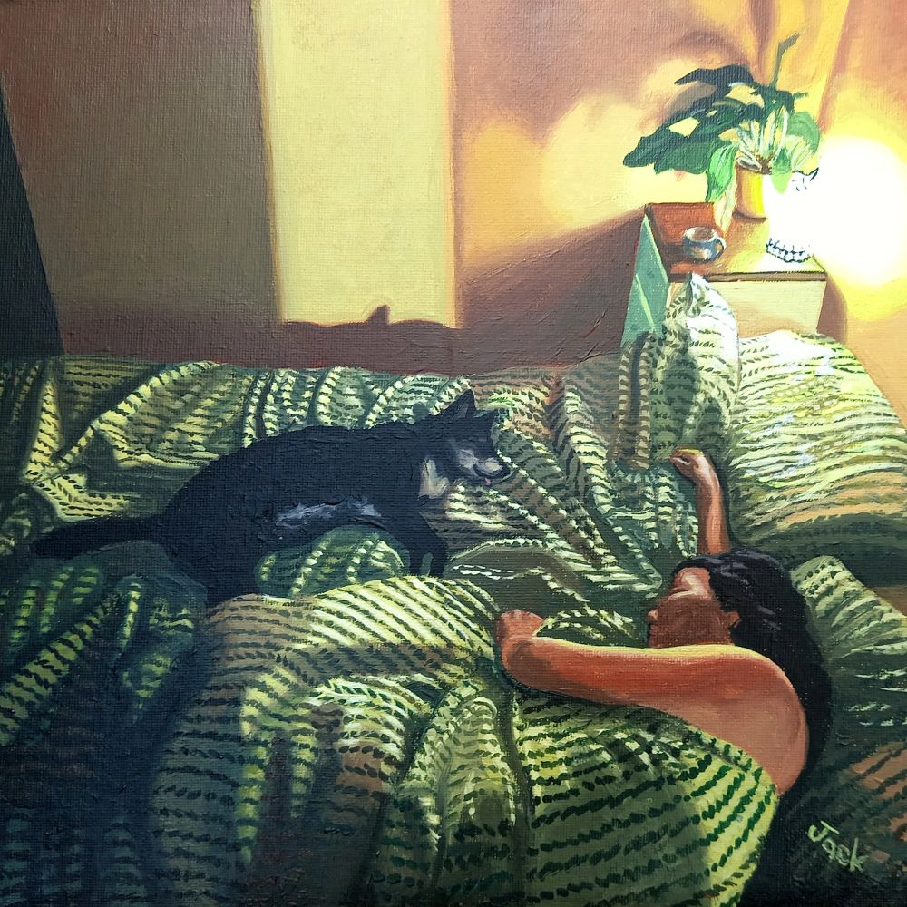 This painting by Jack Greenwood shows Jack's other half Bella in bed asleep next to their old rescue dog, Oma who sadly is no longer with us, also asleep.
The painting is called 'The Sound of Sleep'
Prints are available of this.
The duvet and pillows have a green foliage stripe design and catch the light here and there.
A plant, a mug and a lamp are on a bedside table in the corner.
A shadow of Oma's ear is on the wall. 