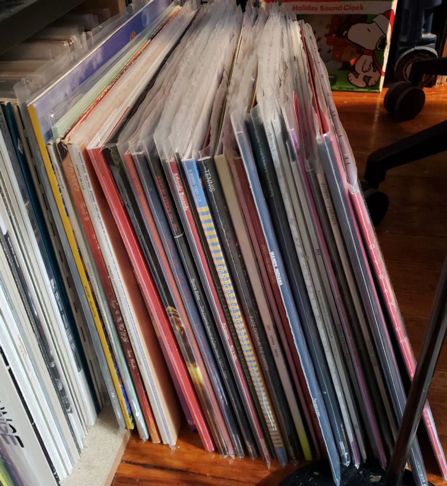 Another small stack of records showing their spines 