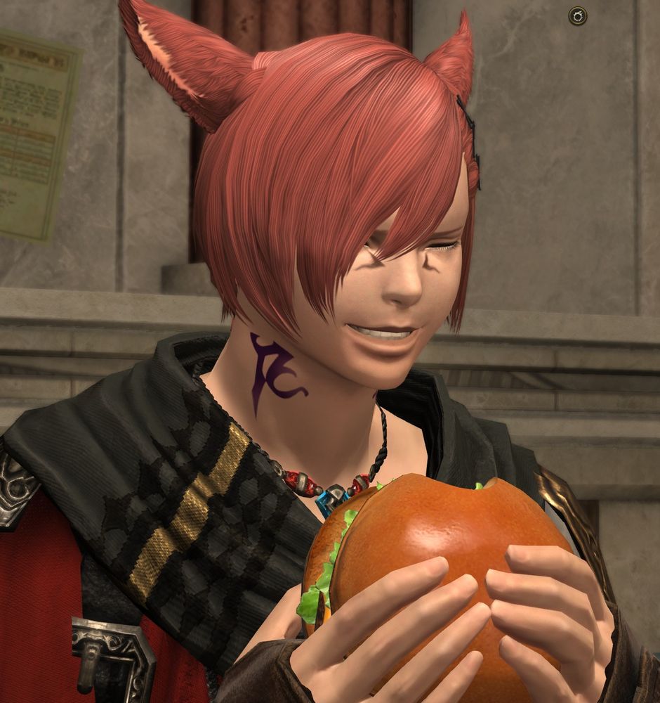 A character from the game Final Fantasy XIV with red hair named G'raha Tia - he is smiling while holding a big burger in his hands. He already took a bite out of it.