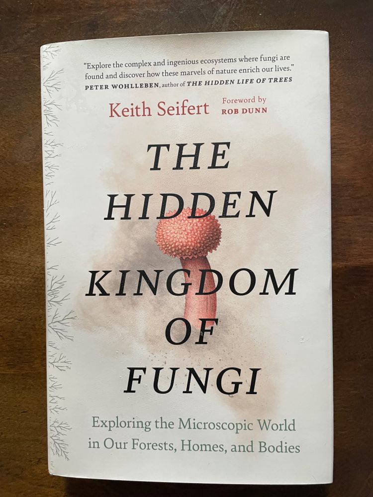 Hardback copy of the book 'the hidden kingdom of fungi: exploring the microscopic world in our forests, homes, and bodies' by Keith Seifert. It looks brand-new and unread. The person should have read it before donating it!