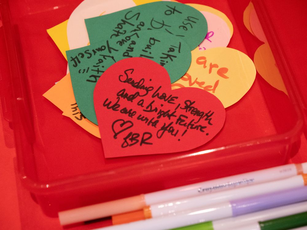 A note left by Senator Lisa Blunt Rochester that says, “Sending love, strength and a bright future. We are with you! <3 LBR