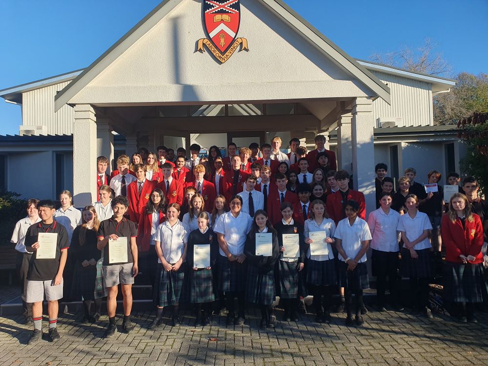 A large number of the over 100 KSF competitors on the hall steps at Geraldine High School. The sun shines on them all.