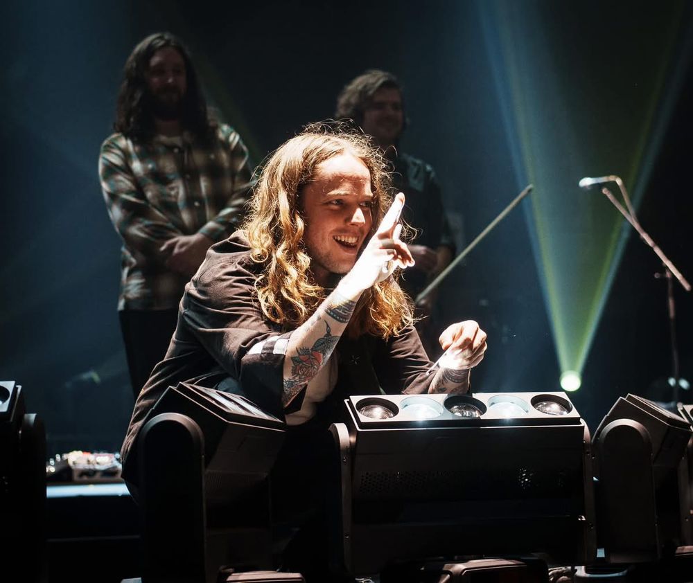 Billy Strings interacts with the crowd after the show 