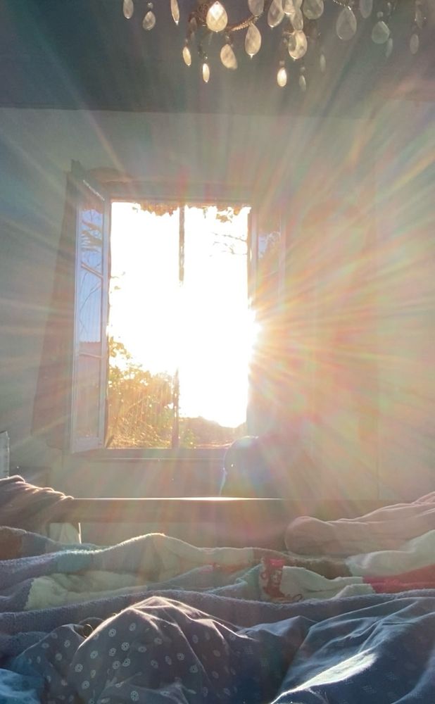 Sun’s rays pouring through Greek window in every direction! 🌅