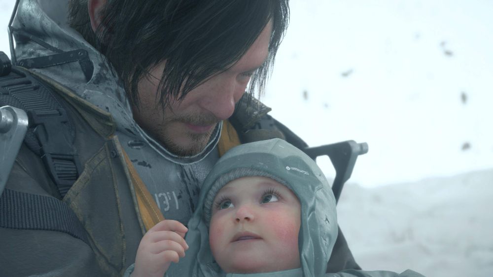 A screenshot of Death Stranding 2: On the Beach showing the game's protagonist, Sam Porter Bridges, holding a baby. 