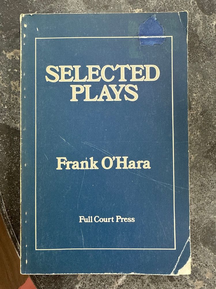 Blue book that is titled selected plays by Frank O’Hara, published by Full Court Press. 