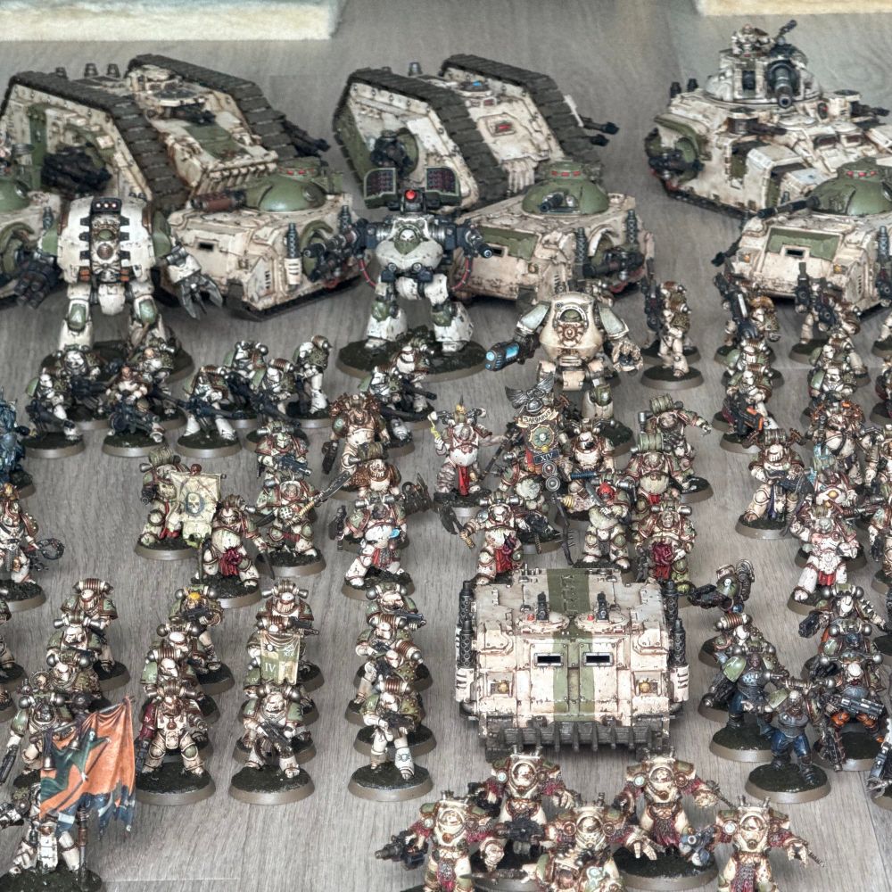 Close up of a Rhino tank surrounded by Death Guard
