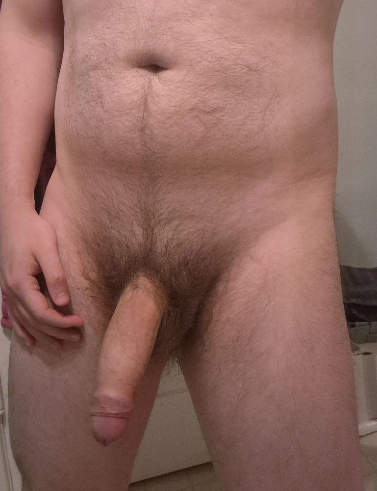A photo of HungYEG from his belly down to his thighs. Everything is thick, but especially his soft cock, hanging extra low and heavy. It'll only get bigger as it wakes up...