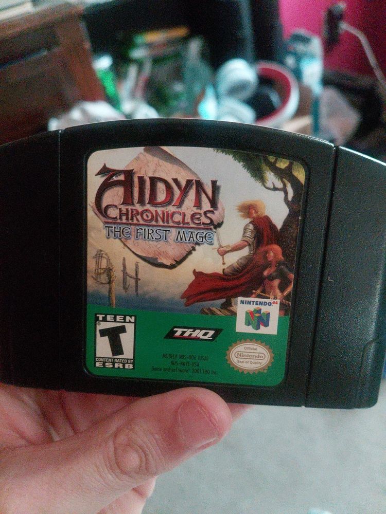 Me holding a copy of Aiden chronicles for the n64.