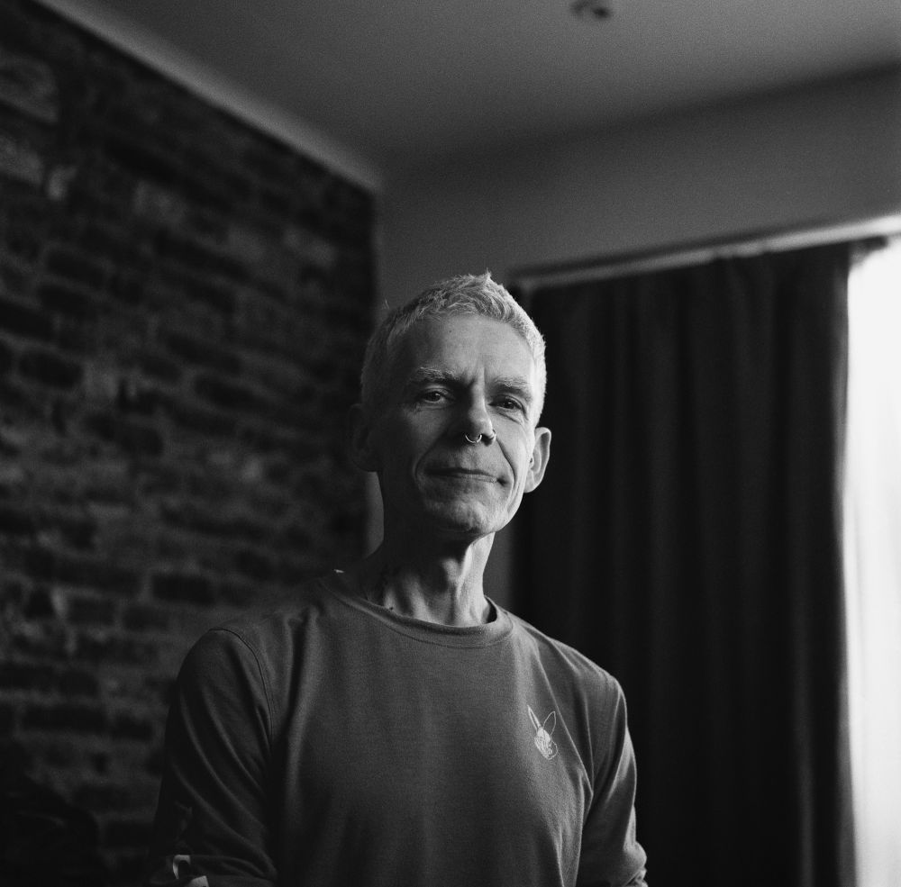 Black and white portrait shot of Anson looking to the camera 

photo credit: @sebgillmore