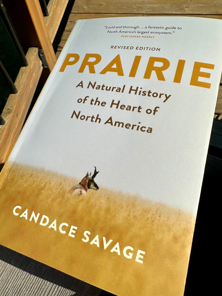 A paperback copy of “Prairie” by Candace Savage. 