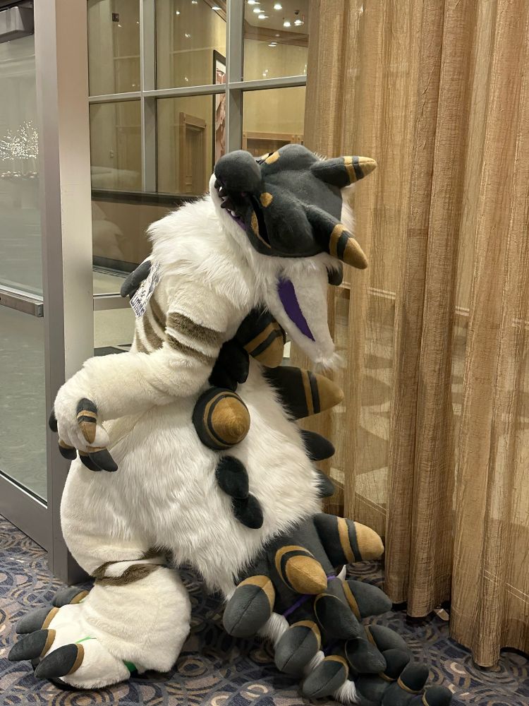 Photo of Luthius fursuit taken by
https://bsky.app/profile/metsyflannelkit.bsky.social