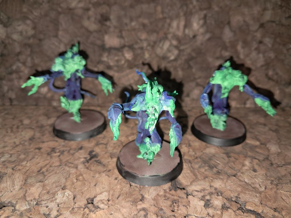 Flamers of Tzeentch with shining Emerald flames.