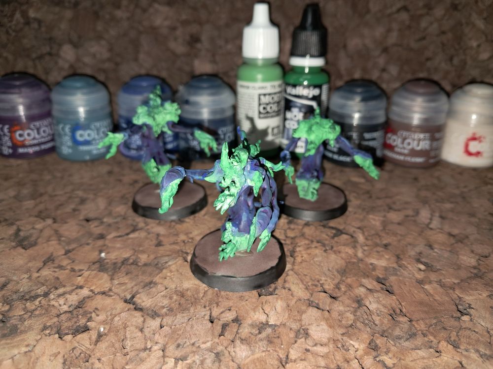 Flamers of Tzeentch with shining Emerald flames.