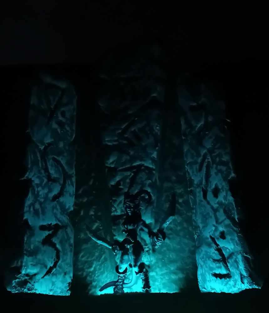The light has faded. Keynsey and the stones are lit with a dull blue-green. The last of the fading blue fires of Hell shine on the edges of her blades and there is a glint in her eye. I think we might be in trouble, lads.