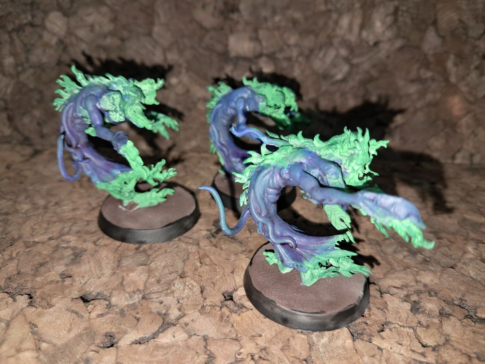 Flamers of Tzeentch with shining Emerald flames.