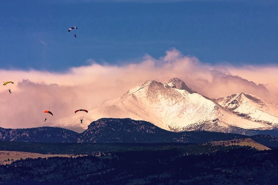 Four skydivers Parachuting in front of the snow capped Rocky Mountains Twin Peaks, Mount Meeker 13,911 ft and Longs Peak 14,256 ft.  www.BoInsogna.com 

Here - https://james-insogna.pixels.com/featured/four-skydivers-with-longs-peak-and-mount-meeker-james-bo-insogna.html

#longspeak #Coloradolandscapes #skydivers #coloradoart #wallart #AYEARFORART #walldecor