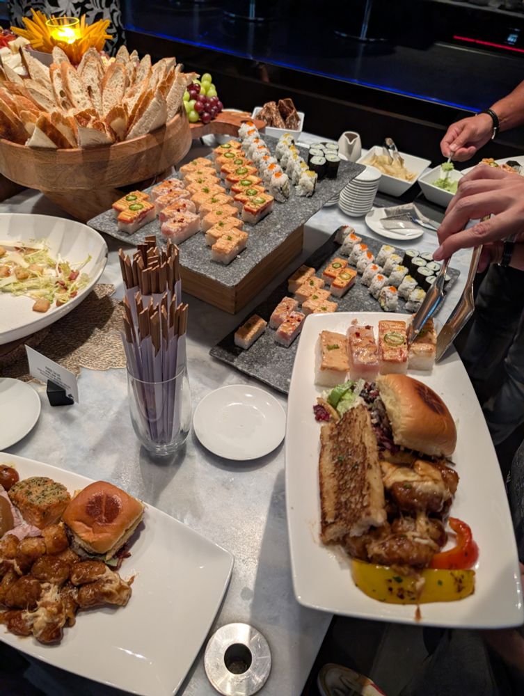 Plating up delicious buffet food.
