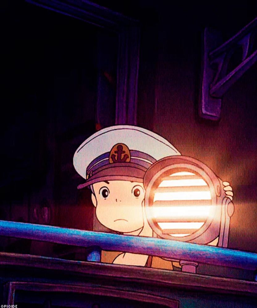 a cartoon character with an anchor on his hat is holding a light in his hand