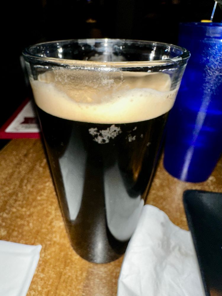 A 22oz glass of Guinness
