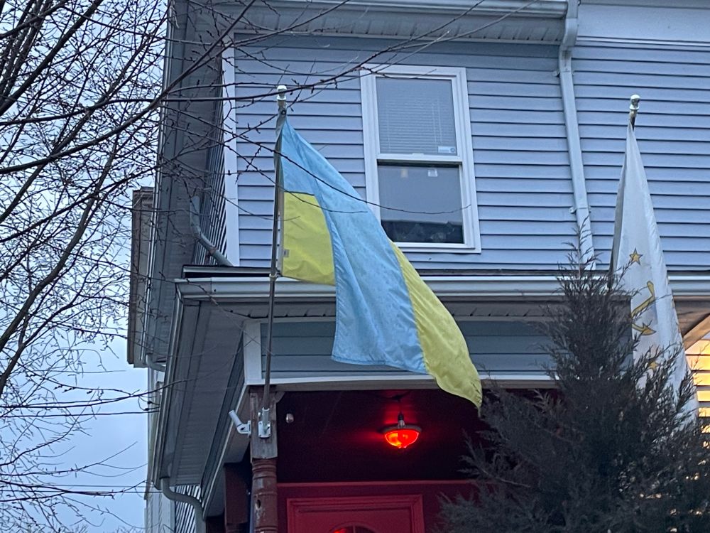 The Ukraine and Rhode Island flags flying from my porch in Providence. 