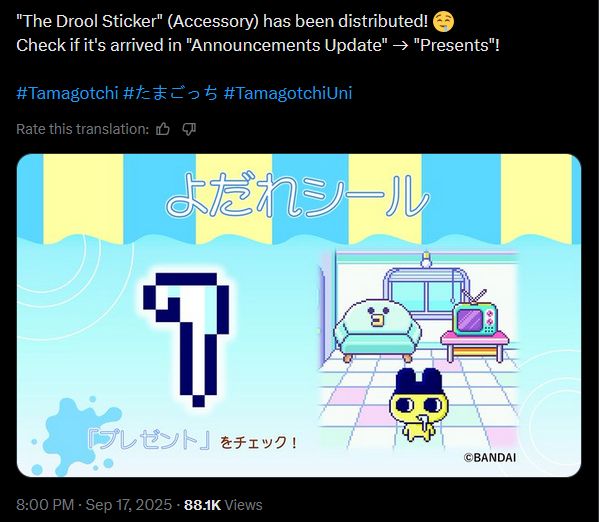 screenshot of a twitter post displaying a "drool sticker" accessory that tamagotchi characters can wear on the tamagotchi uni device