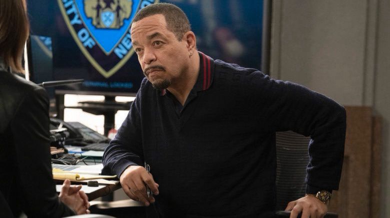 Ice-T staring beadily at everyone in the room