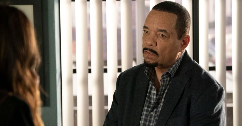 Ice-T staring beadily at the other people in the room