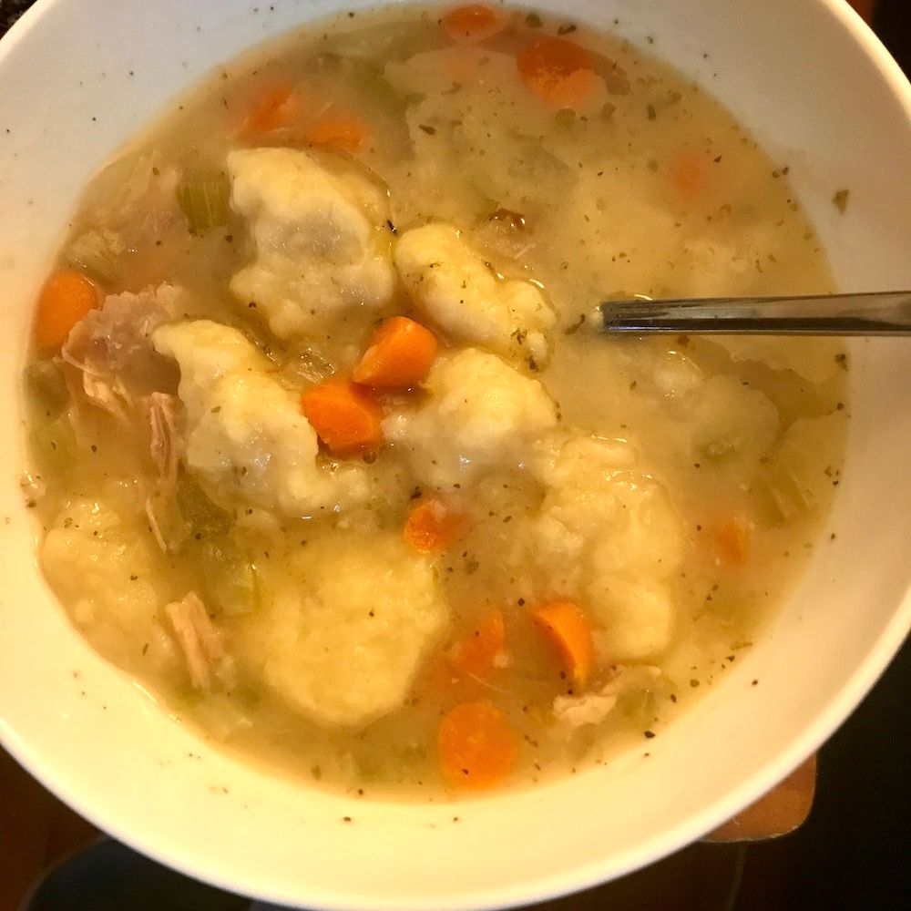 a bowl of chicken soup, the soup made from leftover chicken, with added dumplings made at the last minute because also i'm lazy