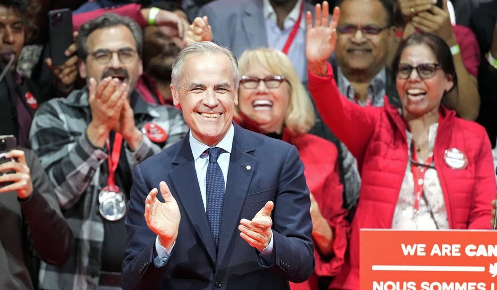 Canadian Prime Minister Mark Carney smiles on stage at his campaign headquarters after the Liberal Party won the Canadian election in Ottawa, Ontario, Tuesday, April 29, 2025.  Frank Gunn/The Canadian Press via AP 