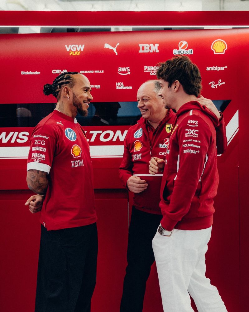 lewis hamilton, fred vasseur, and charles leclerc of scuderia ferrari f1 team