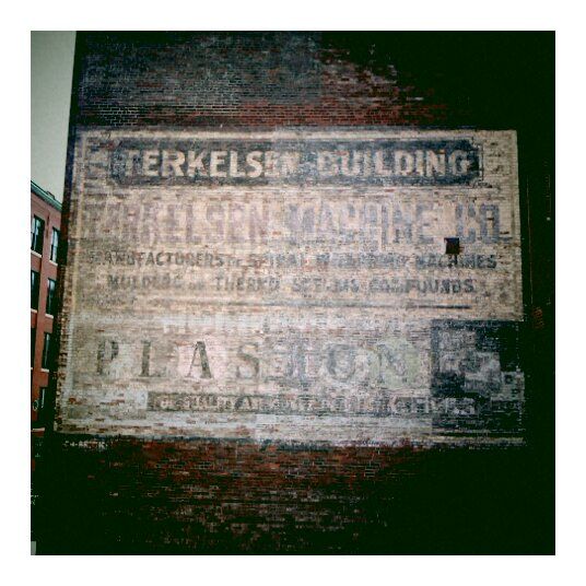 Terkelsen ghost sign, Washing machine manufacturer signage 