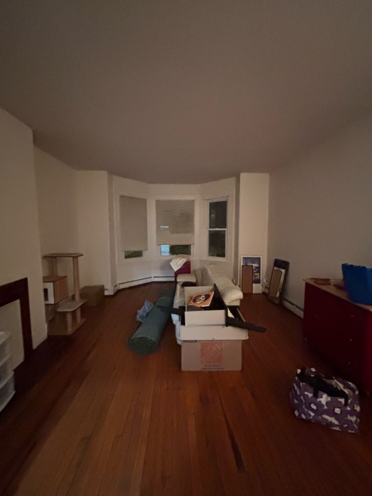 Wide angle shot of an apartment living room 
