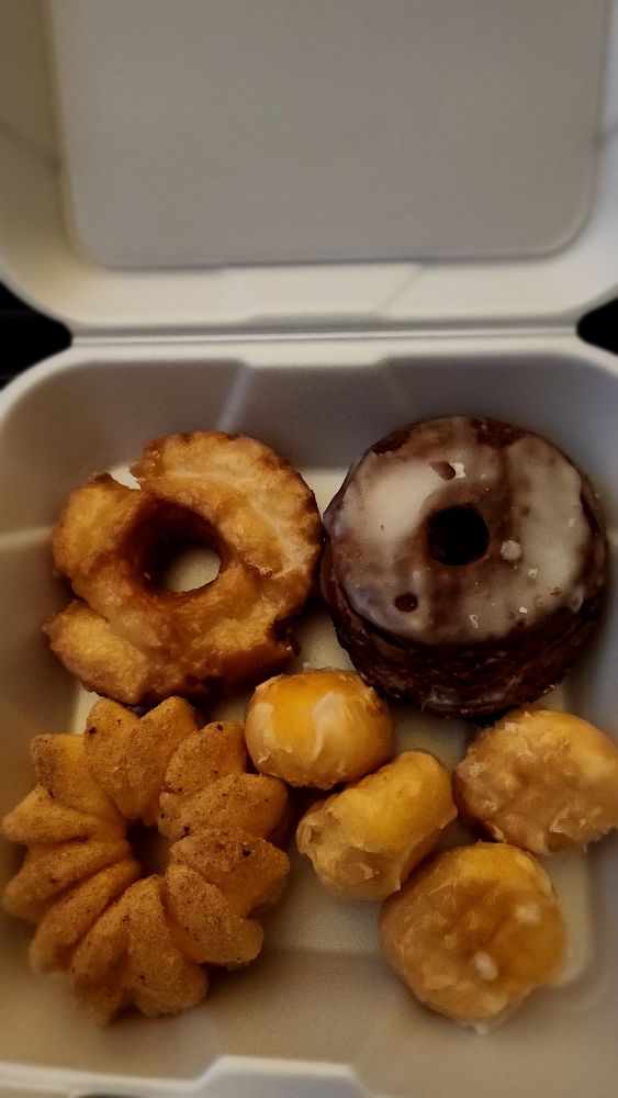 French Cruller, Old Fashioned, the really dark one is a Cronut, and some bonus donut holes