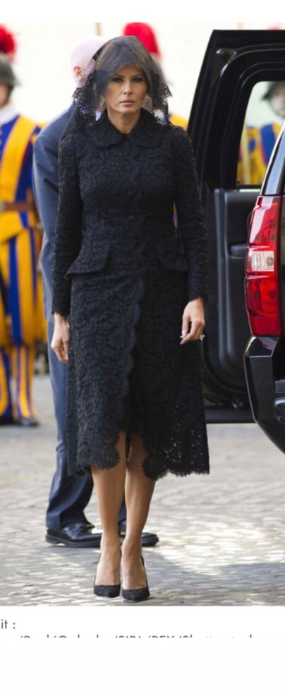 Melania dressed in black 

