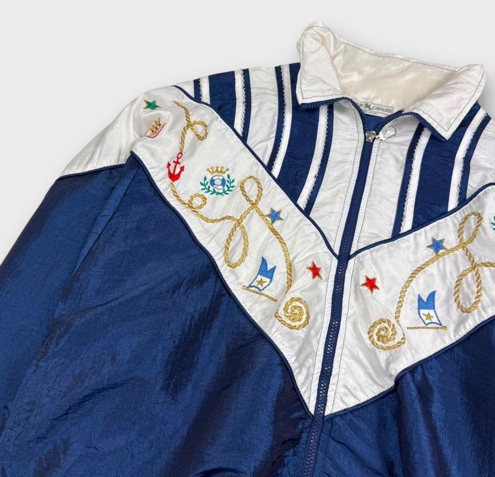 blue and white jacket with western embroidery details 