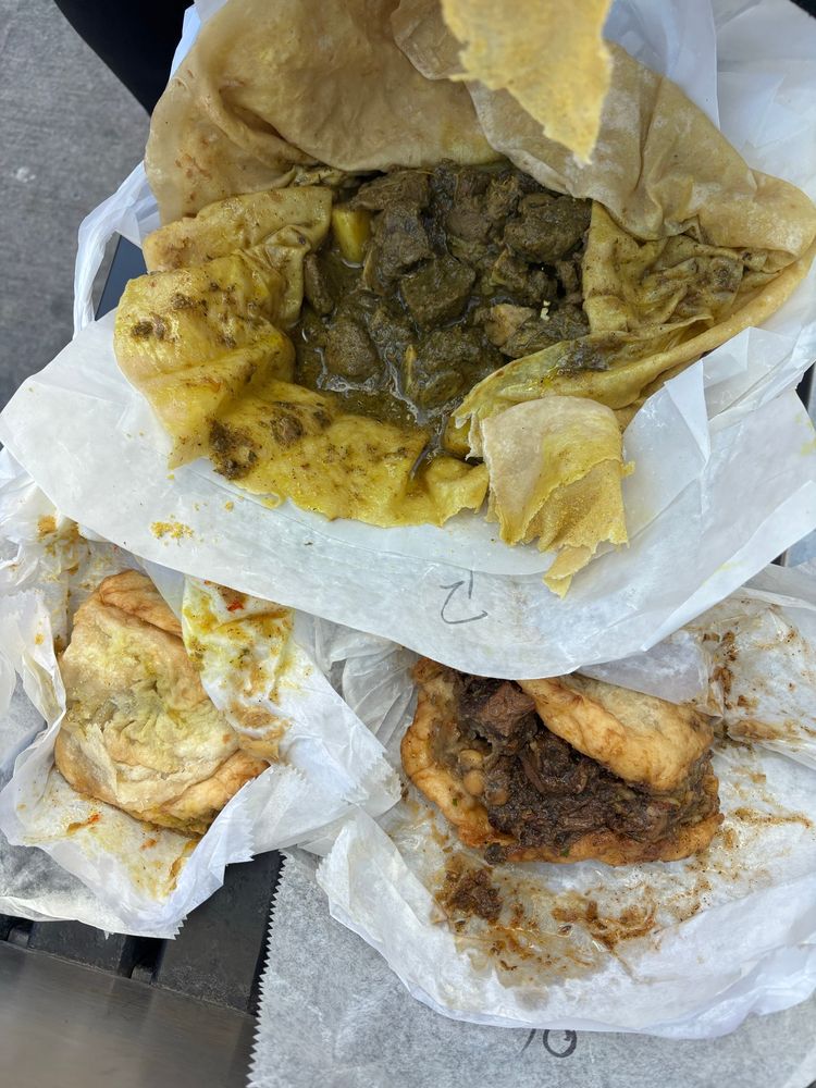Doubles and curry goat roti 