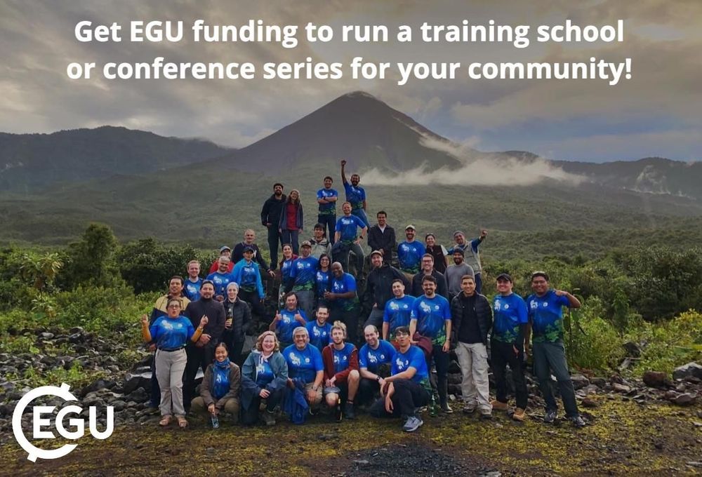 Photo of several people standing in front of a volcanic landscape wearing blue t-shirts and happy smiling faces. Text reads 'Get EGU funding to run a training school or conference series for your community!'
