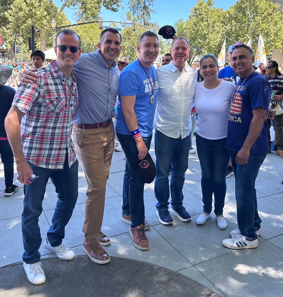 Marc Berman with other elected officials at a 4th of July parade. 